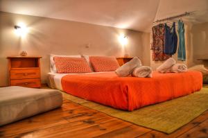 Postel nebo postele na pokoji v ubytování Iro Suites