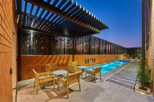 Swimmingpoolen hos eller tæt på City Express Plus by Marriott Tampico