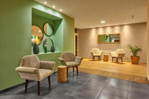 Posezení v ubytování City Express Plus by Marriott Cabo San Lucas