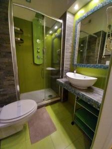 Kúpeľňa v ubytovaní Atmos Luxe Navigli + 37 fotografií