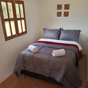 Lova arba lovos apgyvendinimo įstaigoje Guayacan Alojamiento