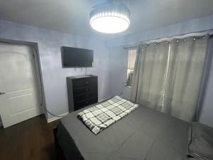 Кровать или кровати в номере Granville appartment