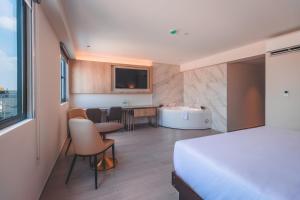 Cama o camas de una habitación en Lyz Business Hotel Piura