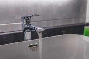 Un baño de Lyz Business Hotel Piura