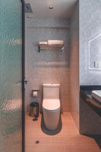 Un baño de Lyz Business Hotel Piura