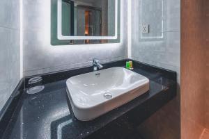 Un baño de Lyz Business Hotel Piura