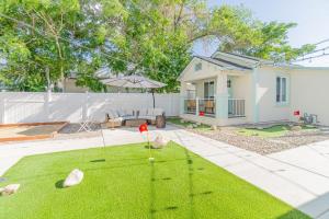 a home with a golf course in the yard at Reno Oasis: Stylish 1-Bedroom Escape in Reno