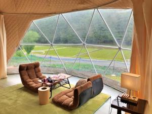 Posezení v ubytování glampark Mashikokan Tochigi