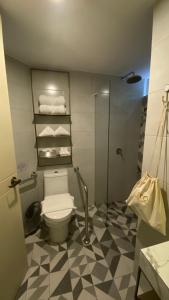 a bathroom with a toilet and a shower at Neo Hotel Boutique in Lima