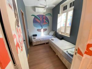 Aurora Hostel Rio客房内的一张或多张床位