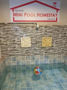 Fotografie z fotogalerie ubytování Teratak Mini Pool Homestay Melaka v destinaci Melaka