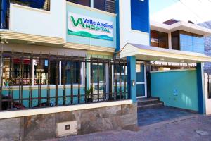 a building with a sign that reads valley antioch hospital at Hostal Valle Andino in El Tambo