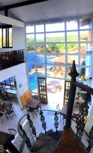 a view from the top of a building with a balcony at Pousada Beluga in Búzios