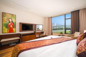 Postelja oz. postelje v sobi nastanitve Minh Toan Galaxy Hotel