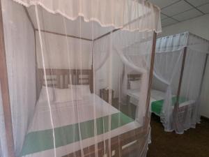 Letto o letti in una camera di Wilpattu Mookalan Resort