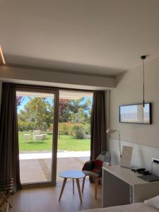 โทรทัศน์และ/หรือระบบความบันเทิงของ Comfortable Bel Etage Luxury Rooms - Room 3