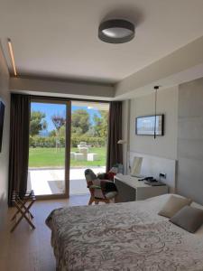 เตียงในห้องที่ Bel Etage Luxury Rooms - Comfortable Room close to the beach +10 ภาพ