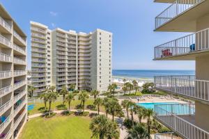 a view of the ocean from the balcony of a resort at Seaside Beach & Racquet 5614 in Romar Beach