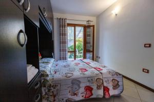 A bed or beds in a room at Casa Lilla 1 e 2