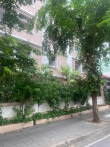a building with plants on the side of it at Viriyapon2 in Bangkok