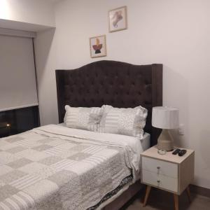 A bed or beds in a room at Awesome apartment in the best area of ​​Miraflores