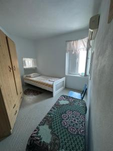 Letto o letti in una camera di Cycladic house with amazing view in Potamia village