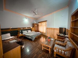 TV a/nebo společenská místnost v ubytování Hotel shaynam + 7 fotografií