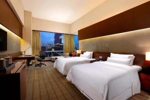 Postel nebo postele na pokoji v ubytování The Westin Guangzhou
