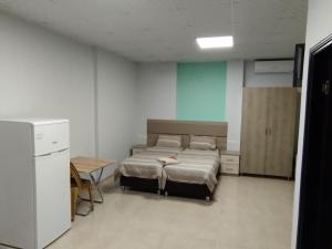 Studio Apartments-Beit Jala by JK 객실 침대
