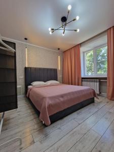 Postel nebo postele na pokoji v ubytování COMFORTable apartment in the center