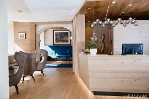 Posezení v ubytování Hotel Weisser Hirsch