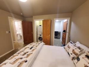 Postel nebo postele na pokoji v ubytování Koru Flat