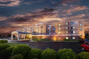a rendering of a hotel with a parking lot at Courtyard by Marriott Fayetteville in Fayetteville