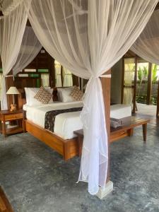 Letto o letti in una camera di Sarini Villas