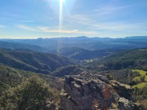 a view of the mountains from the top of a mountain at Camping à la ferme in Saint-Germain-de-Calberte