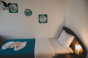 Katil atau katil-katil dalam bilik di Hotel Orlovetz +38 gambar