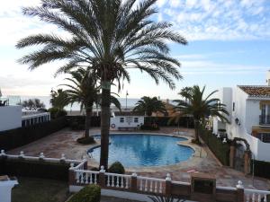 Bazén v ubytování MP Casa 15 Mijas Playa Club 3 bedroom house nebo v jeho okolí