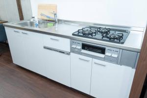 Una cocina o zona de cocina en Kyobashi house Entire house for rentー 京橋一軒家完全貸切