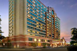 a rendering of a tall building with a church at Courtyard Arlington Crystal City/Reagan National Airport in Arlington