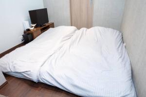 Cama o camas de una habitación en Kyobashi house Entire house for rentー 京橋一軒家完全貸切