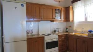 A kitchen or kitchenette at Sea La Vie