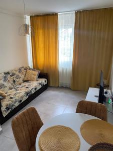 Ένα ή περισσότερα κρεβάτια σε δωμάτιο στο Sofi Apartment Central