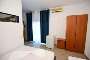 Postel nebo postele na pokoji v ubytování Koa Hotel