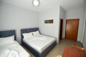 Postel nebo postele na pokoji v ubytování Koa Hotel