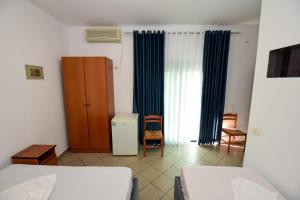 Postel nebo postele na pokoji v ubytování Koa Hotel