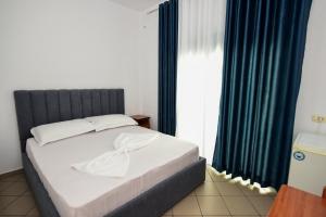 Postel nebo postele na pokoji v ubytování Koa Hotel