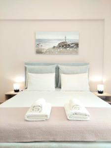 Postel nebo postele na pokoji v ubytování Elizabeth Apartments Himare