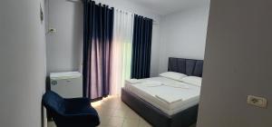 Postel nebo postele na pokoji v ubytování Koa Hotel