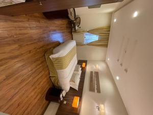 سرير أو أسرّة في غرفة في فندق كارم مكة - Karim Makka Hotel