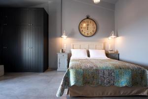 Кровать или кровати в номере Sagiada Homes